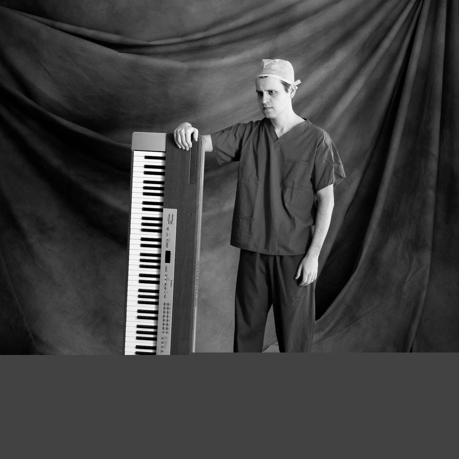 Adam Kay from Amateur Transplants dressed as surgeon, 2011 publicity shot